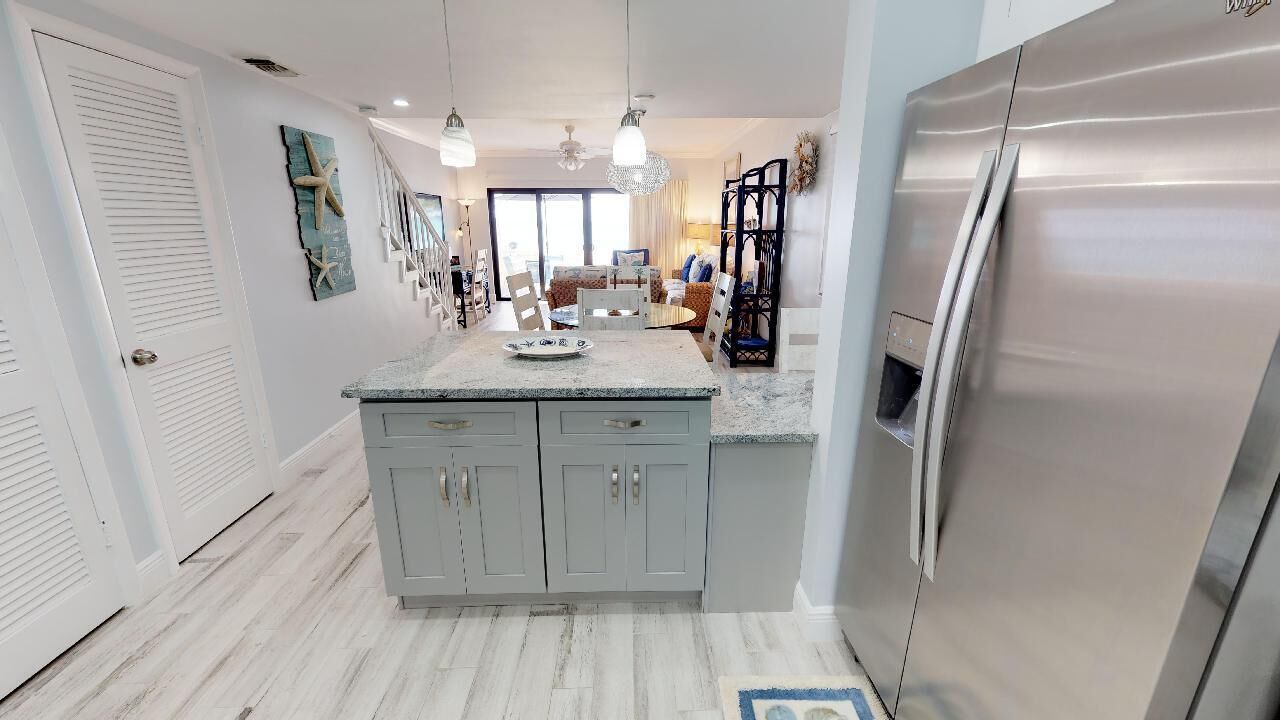 Beachfront Bliss: 2BR Ground Floor Town House | Private kitchen | Fridge, microwave, oven, stovetop