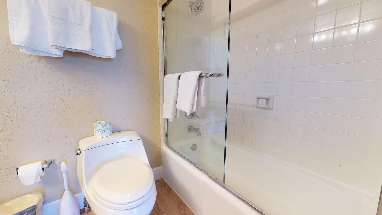 stunning ocean view, 2-story 2br condo | bathroom | combined shower/bathtub, rainfall showerhead, free toiletries