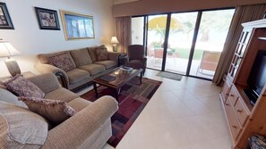 Beachfront 2Br, Ground Floor Condo | Living area | 43-inch flat-screen TV with cable channels, TV, DVD player - The Islands Club (Seven Mile Beach)