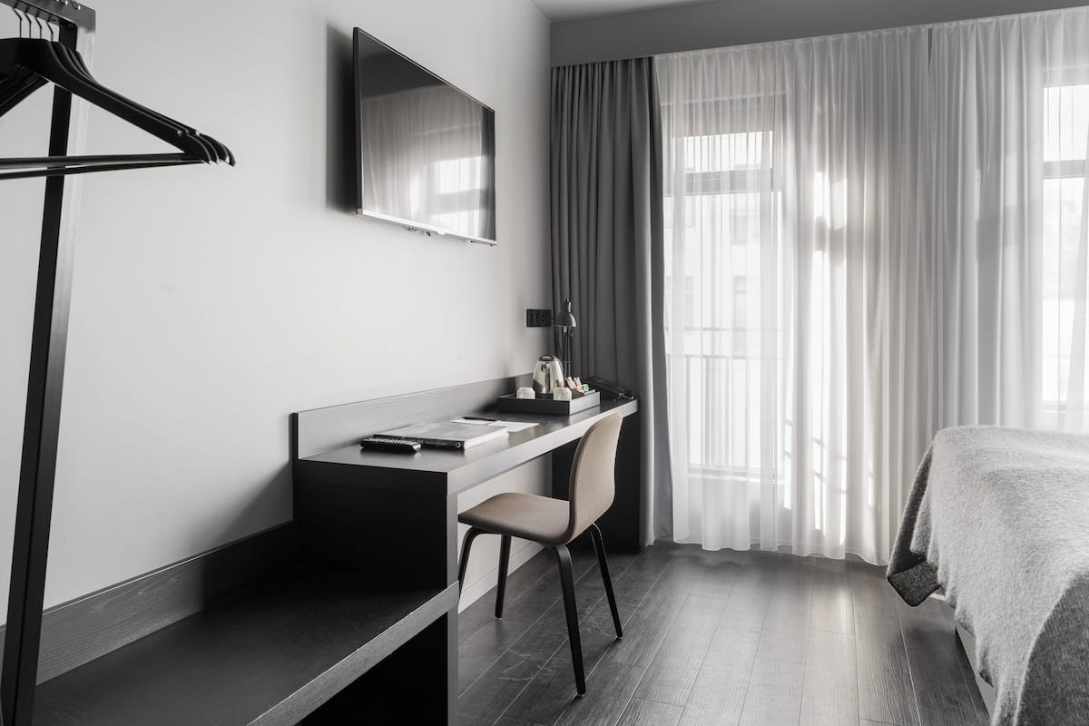 Premium bedding, desk, blackout curtains, iron/ironing board