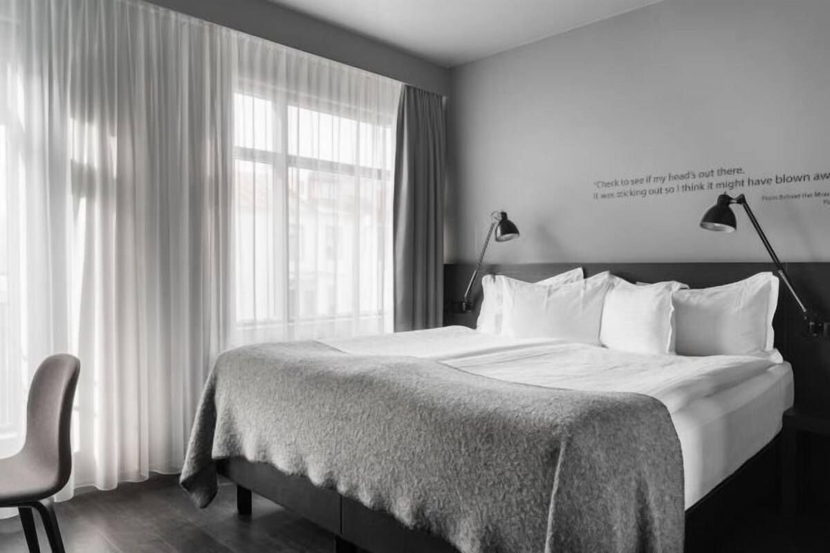 Premium bedding, desk, blackout curtains
