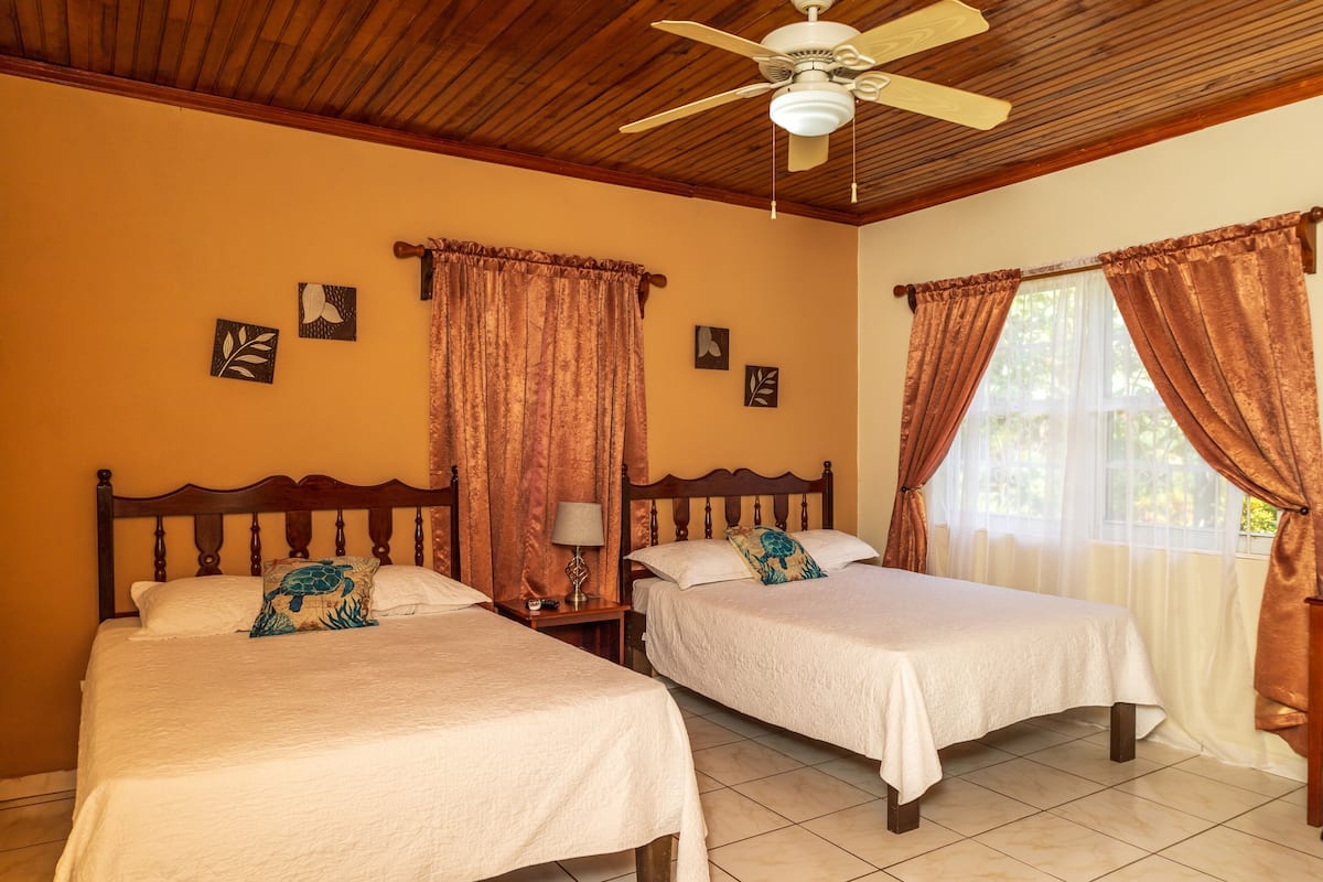Basic Double Room, Garden View | In-room safe, desk, bed sheets