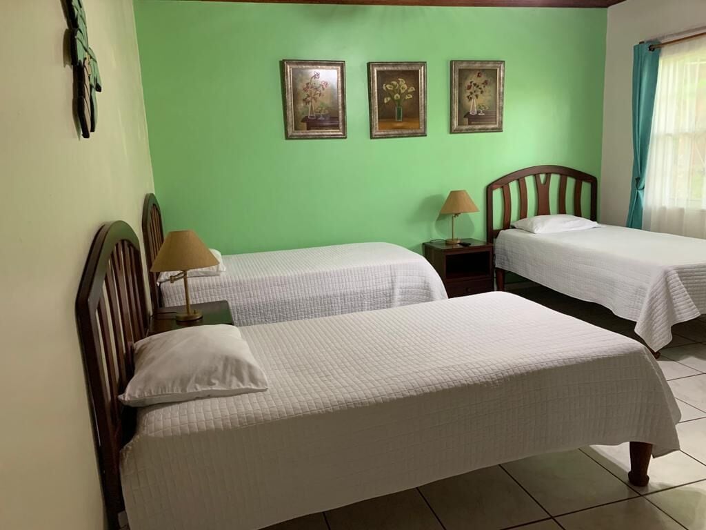 basic triple room | in-room safe, desk, bed sheets