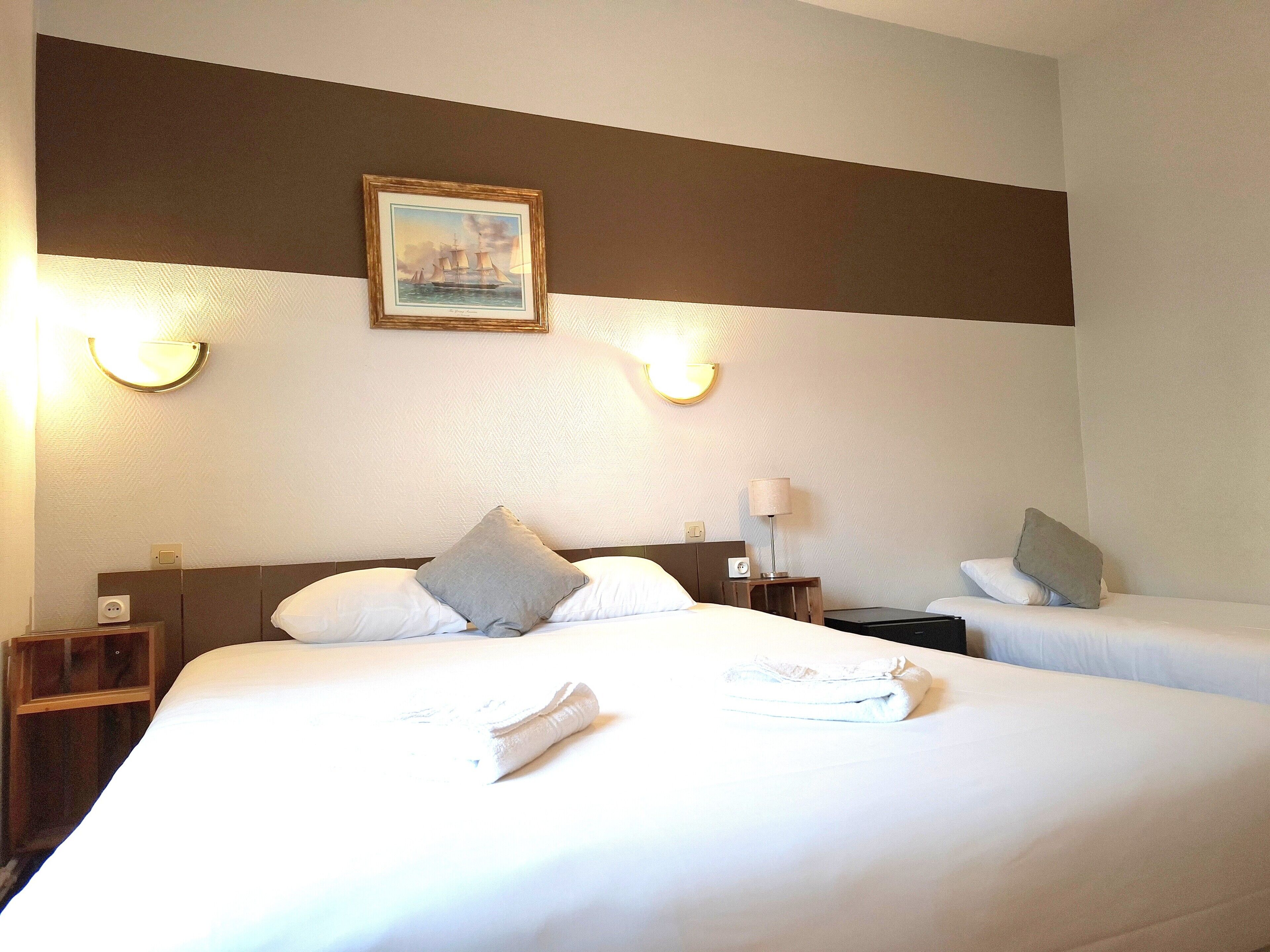 Triple Room | In-room safe, desk, laptop workspace, blackout curtains