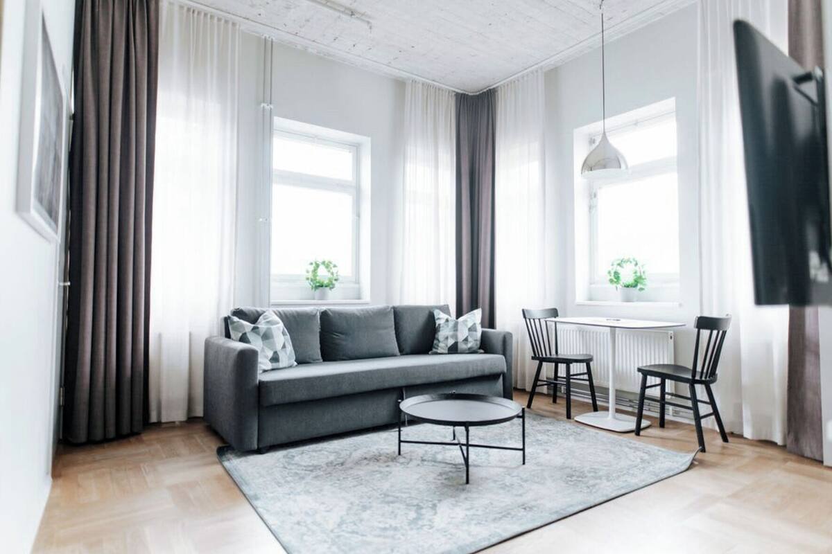 Appartement, 1 slaapkamer, kitchenette | Een strijkplank/strijkijzer, gratis wifi, beddengoed
