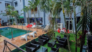 Outdoor pool, open 6:00 AM to 8:00 PM, pool umbrellas, sun loungers