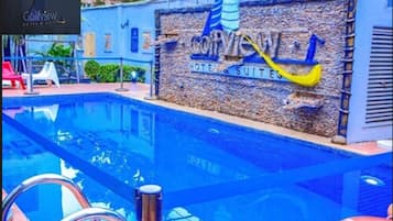 Outdoor pool, open 6:00 AM to 8:00 PM, pool umbrellas, sun loungers