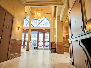 Hotel entrance and lobby at Executive Hotel Le Soleil New York