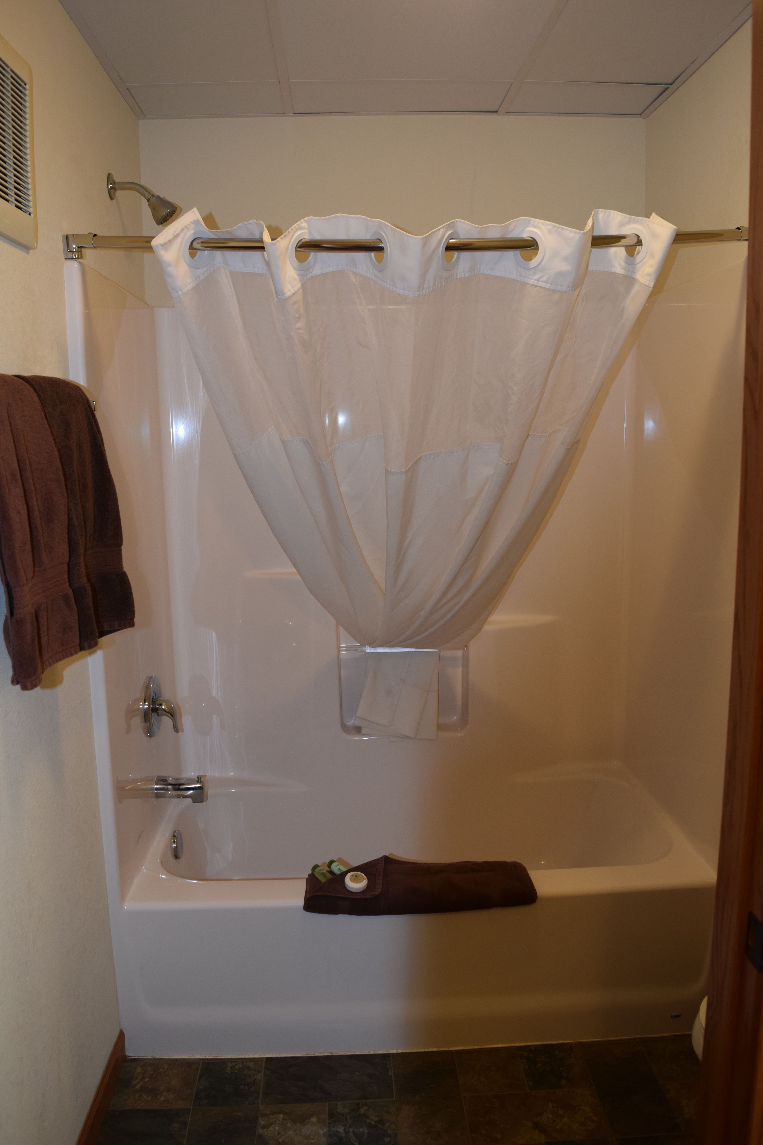 combined shower/bathtub, free toiletries, hair dryer, towels