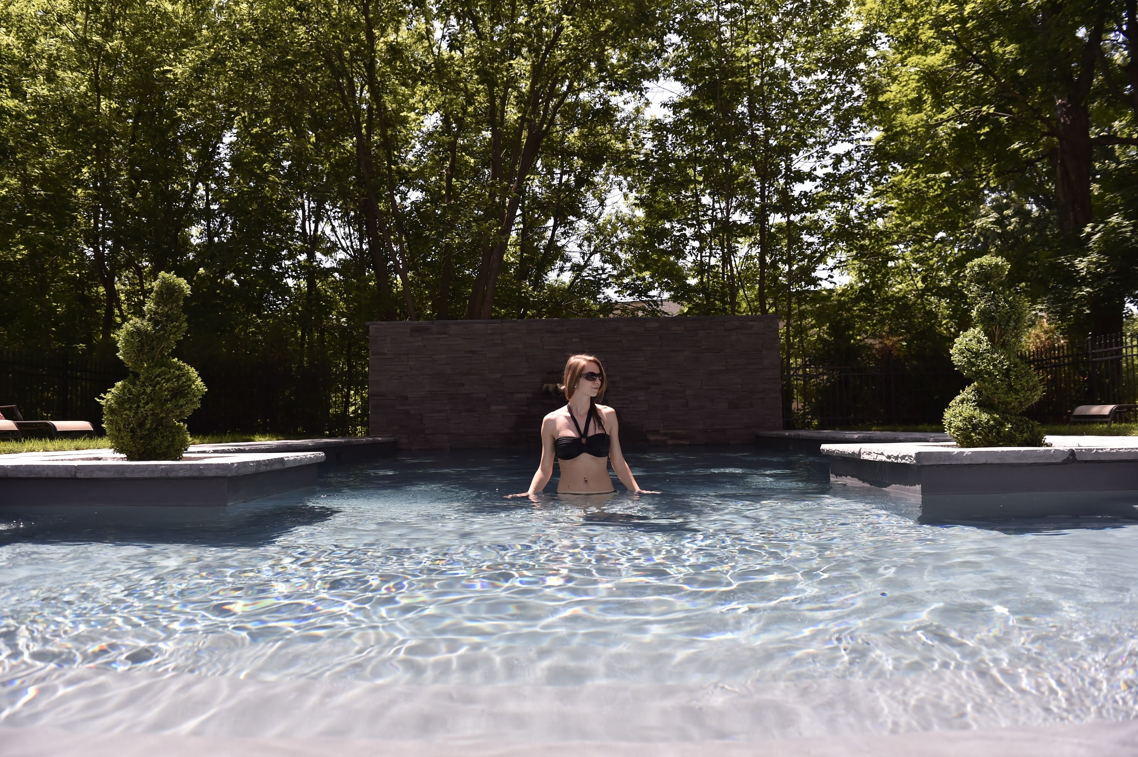 seasonal outdoor pool, pool umbrellas, pool loungers