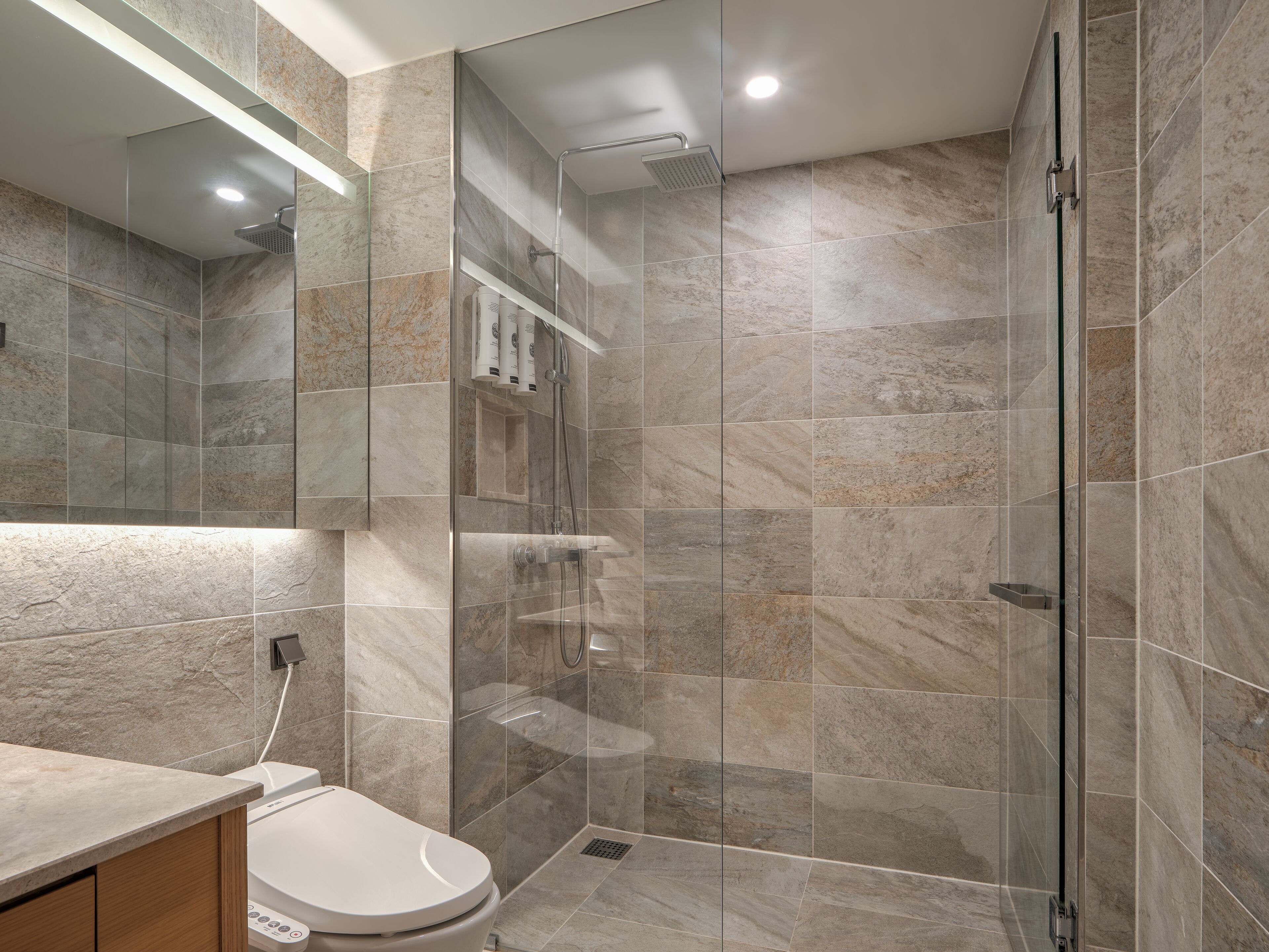 shower, hair dryer, slippers, bidet