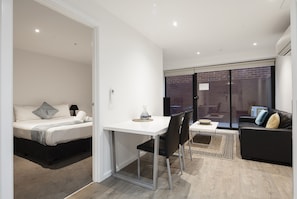 50-inch Smart TV with satellite channels, TV - RNR Serviced Apartments North Melbourne (North Melbourne)