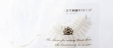 A white package with a label that includes the text "The chance for victory Visits those who Continually lie in wait" and some Japanese characters.