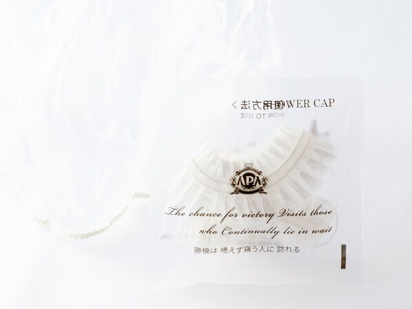 A white package with a label that includes the text "The chance for victory Visits those who Continually lie in wait" and some Japanese characters.