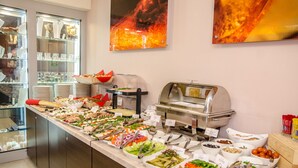A buffet with various food items and a self-service station. - Hotel Emocja SPA (Mielno)