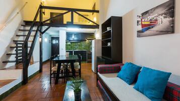 Duplex, 1 Bedroom | Living area | Flat-screen TV