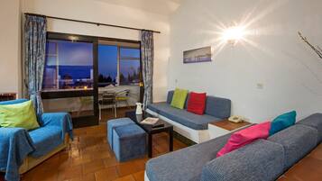 Apartment, 2 Bedrooms | Living area | Flat-screen TV