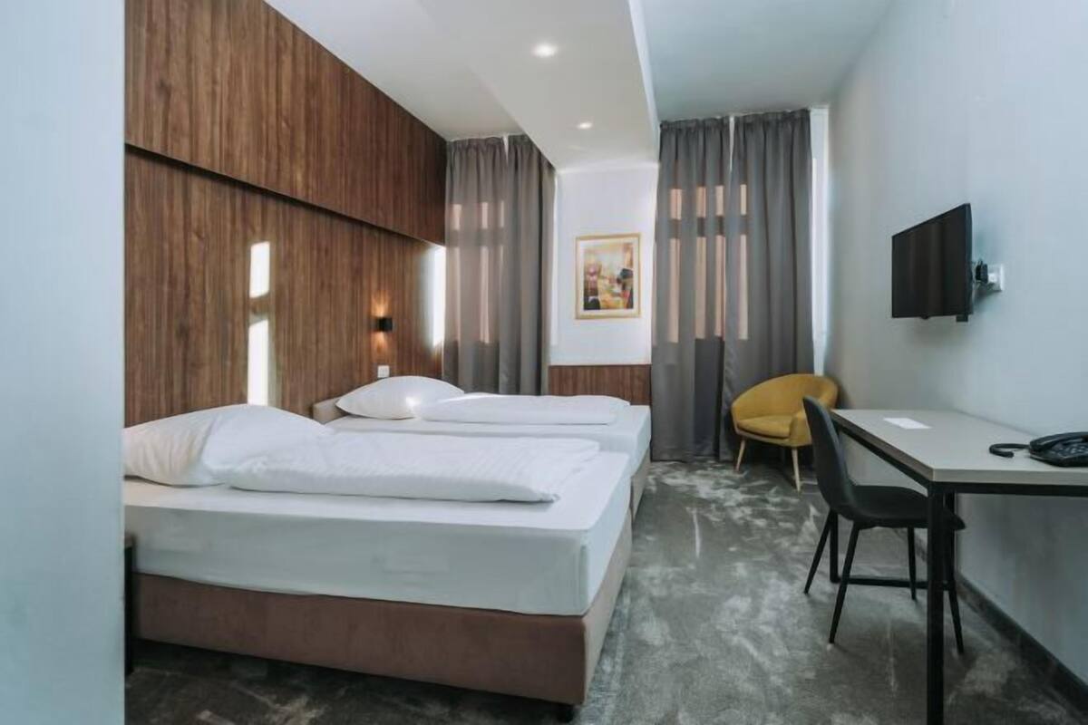 Desk, WiFi (free), bed sheets