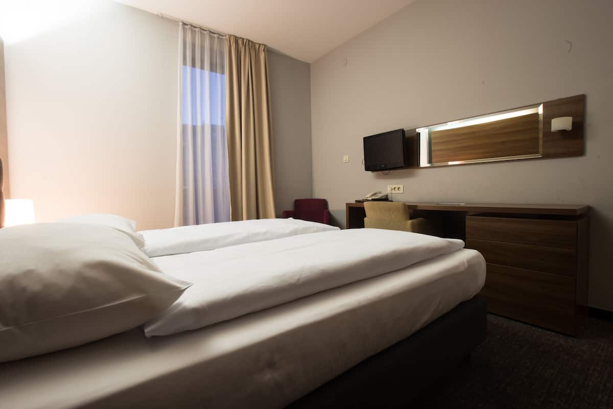Desk, free WiFi, bed sheets