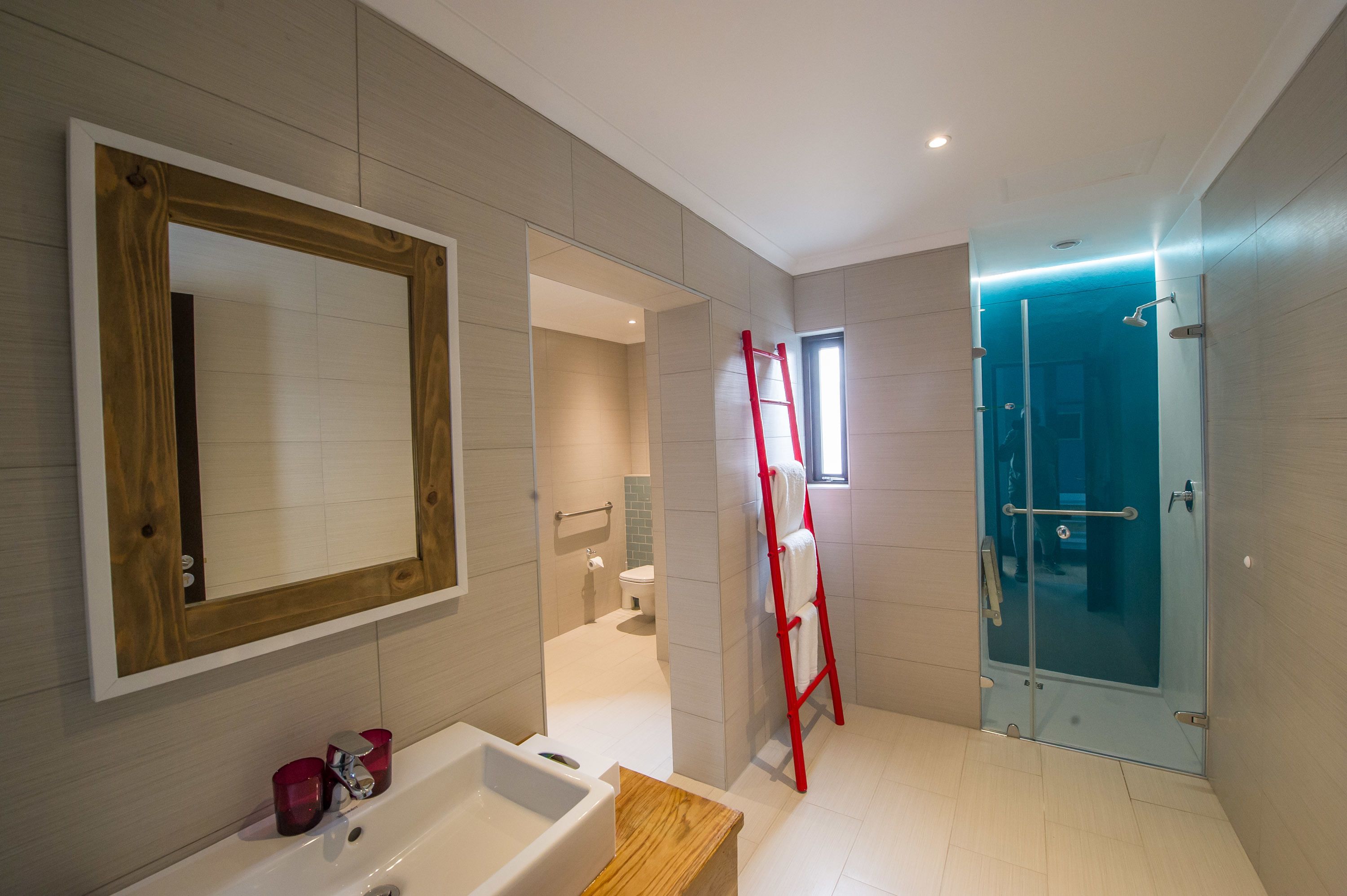 shower, rainfall showerhead, hair dryer, towels