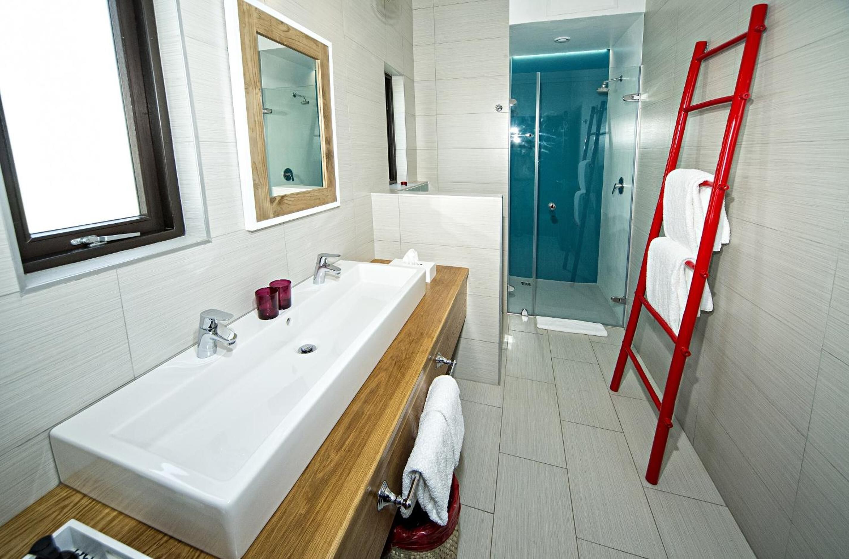 shower, rainfall showerhead, hair dryer, towels