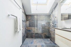 Ari village loft | Bathroom | Hair dryer, towels