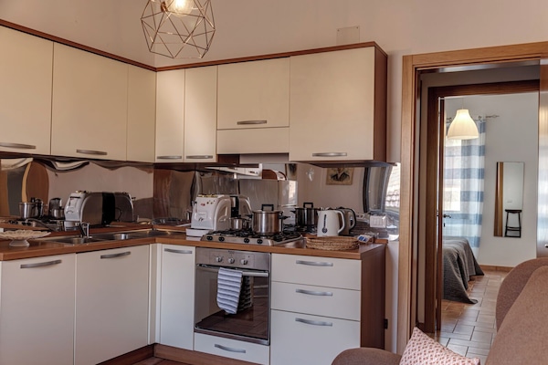 Deluxe Room | Private kitchen | Coffee/tea maker