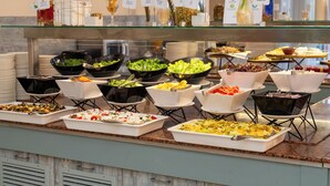 A buffet with various food stations, including salads, vegetables, and pasta dishes. - MPM Hotel Astoria (Sunny Beach)