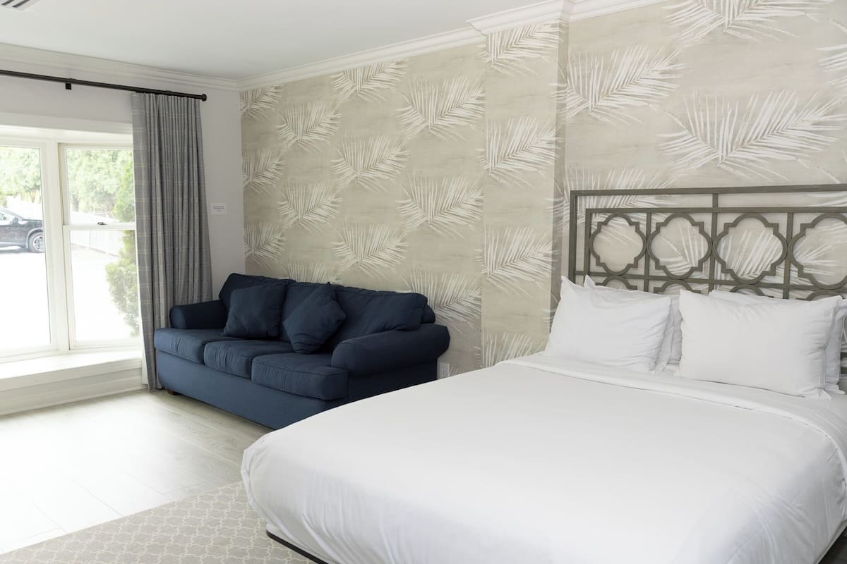 Habitación Deluxe, 2 camas de matrimonio (Non Lake View) | Ropa de cama de alta calidad, tabla de planchar con plancha, wifi gratis