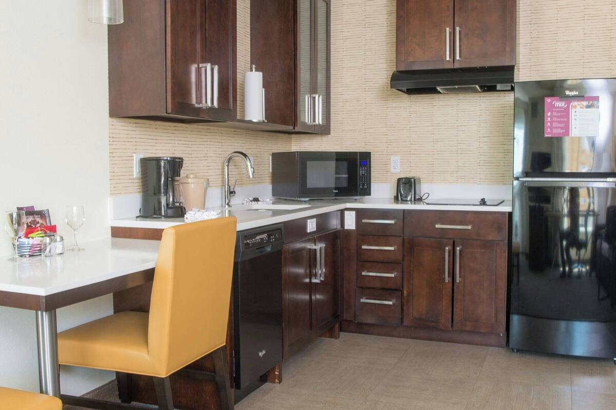 studio, 1 king bed with sofa bed | private kitchen | full-sized fridge, microwave, stovetop, dishwasher