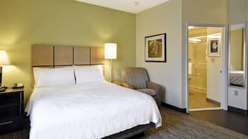 Premium bedding, pillow-top beds, desk, laptop workspace
