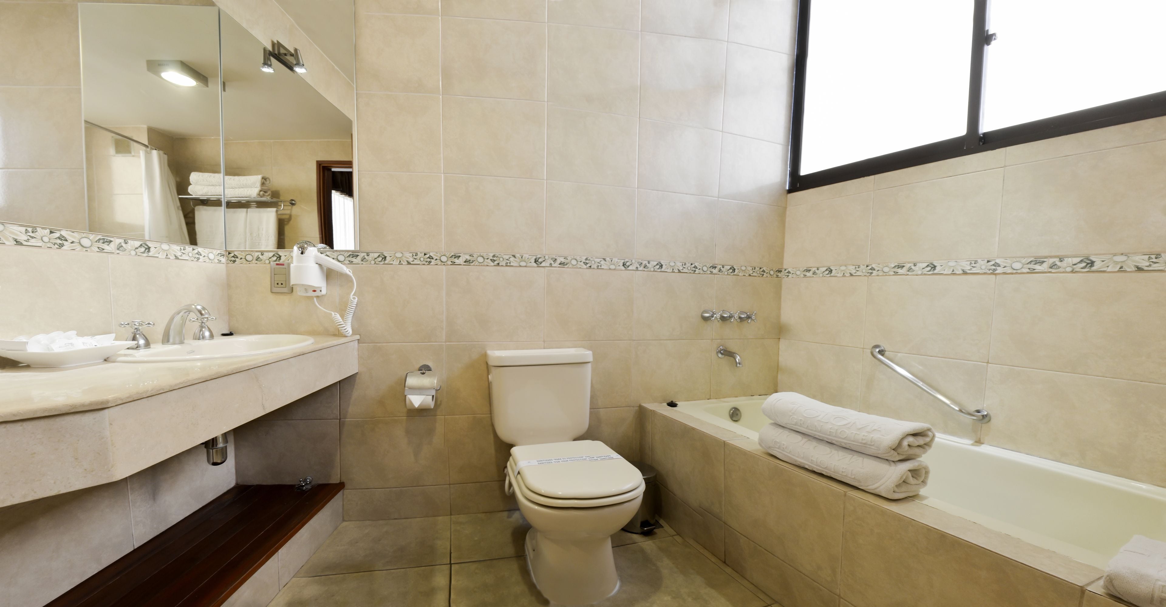 family room | bathroom | combined shower/bathtub, deep-soaking bathtub, free toiletries