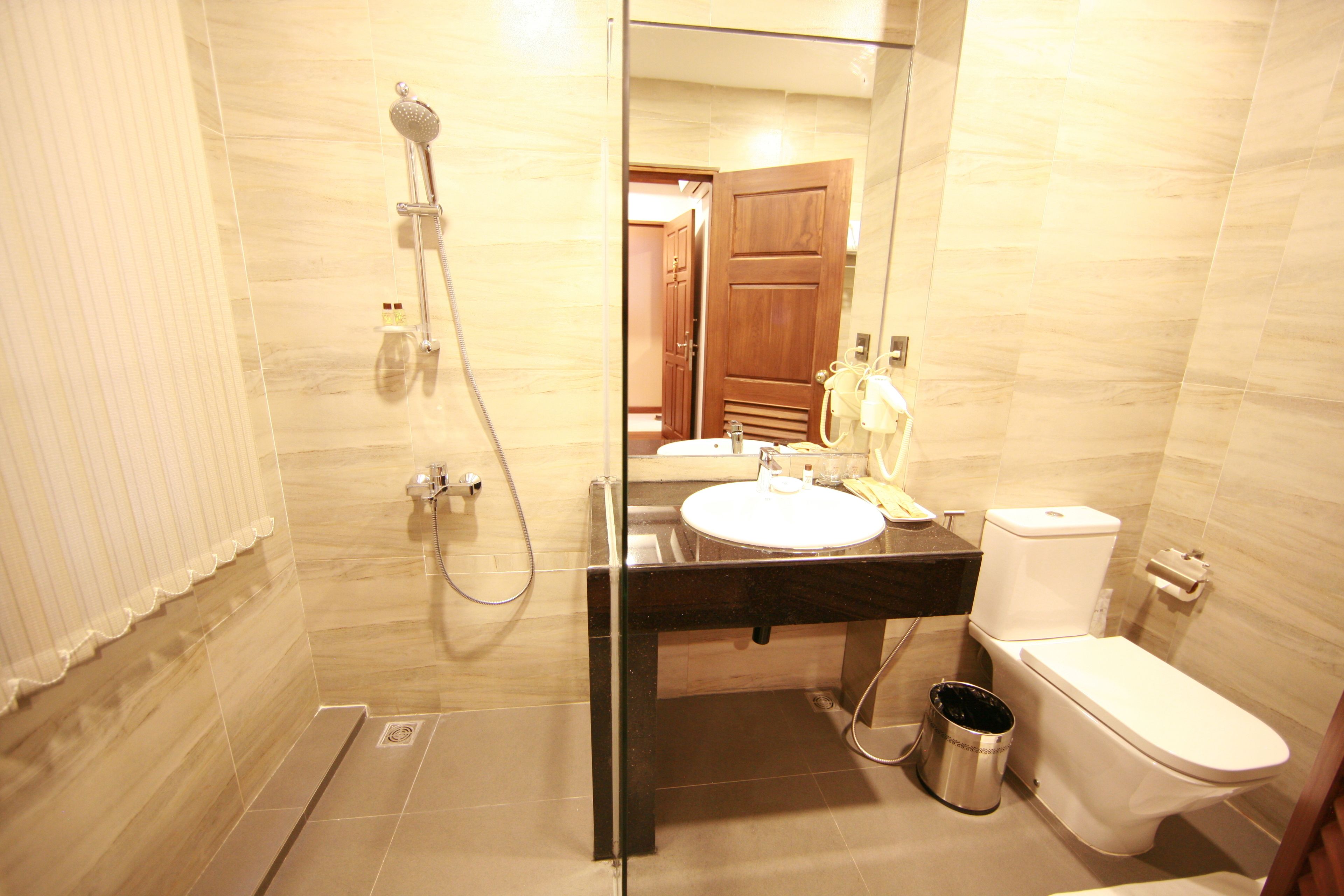junior double or twin room | bathroom | free toiletries, hair dryer, bathrobes, slippers