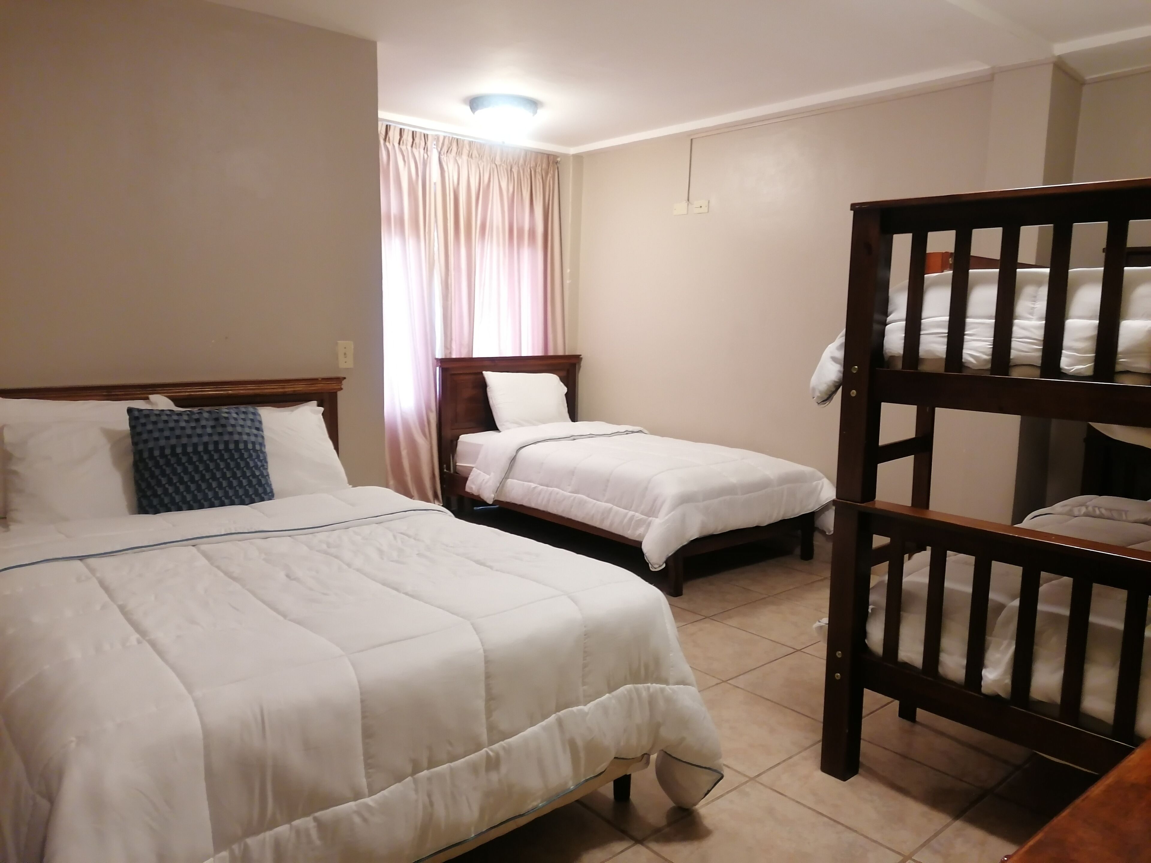 family triple room, multiple beds | blackout curtains, rollaway beds, free wifi, bed sheets