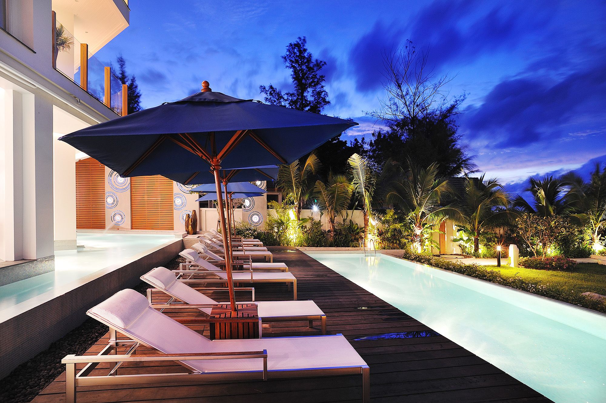 outdoor pool, pool umbrellas, pool loungers