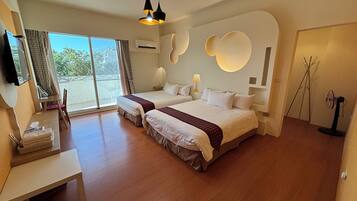 Kamar Quadruple Standar, 2 Tempat Tidur Double | Kamar mandi | Shower, perlengkapan mandi gratis, pengering rambut, dan sandal