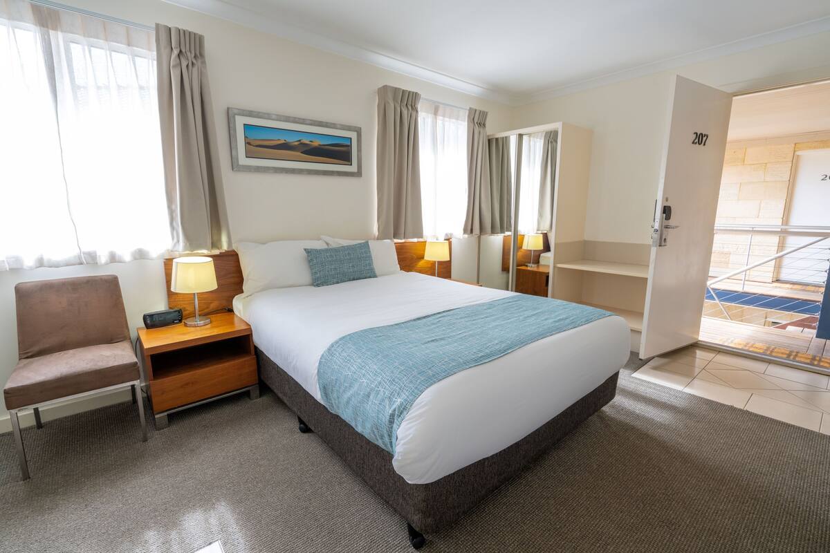 deluxe studio room | premium bedding, iron/ironing board, free wifi, bed sheets