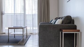 Premium bedding, blackout curtains, iron/ironing board, free WiFi
