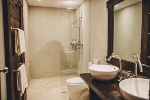 Room, 1 King Bed, Garden View | Bathroom | Shower, free toiletries, hair dryer, slippers