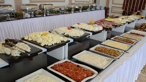 A buffet with various food options, including pasta, salads, and desserts. - Karbel Beach Hotel (Fethiye)