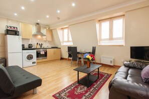 Classic Apartment, 1 Bedroom, City View | Living area | Flat-screen TV, DVD player - Tower of Hamlets Apartments (London)