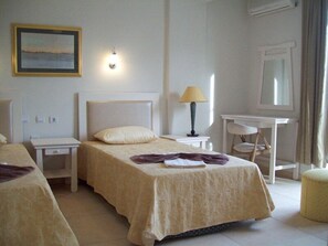 Standard Triple Room | Premium bedding, desk, iron/ironing board, free cribs/infant beds