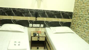 Family Room | Minibar, in-room safe, rollaway beds, free WiFi