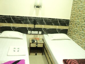 Family Room | Minibar, in-room safe, rollaway beds, free WiFi