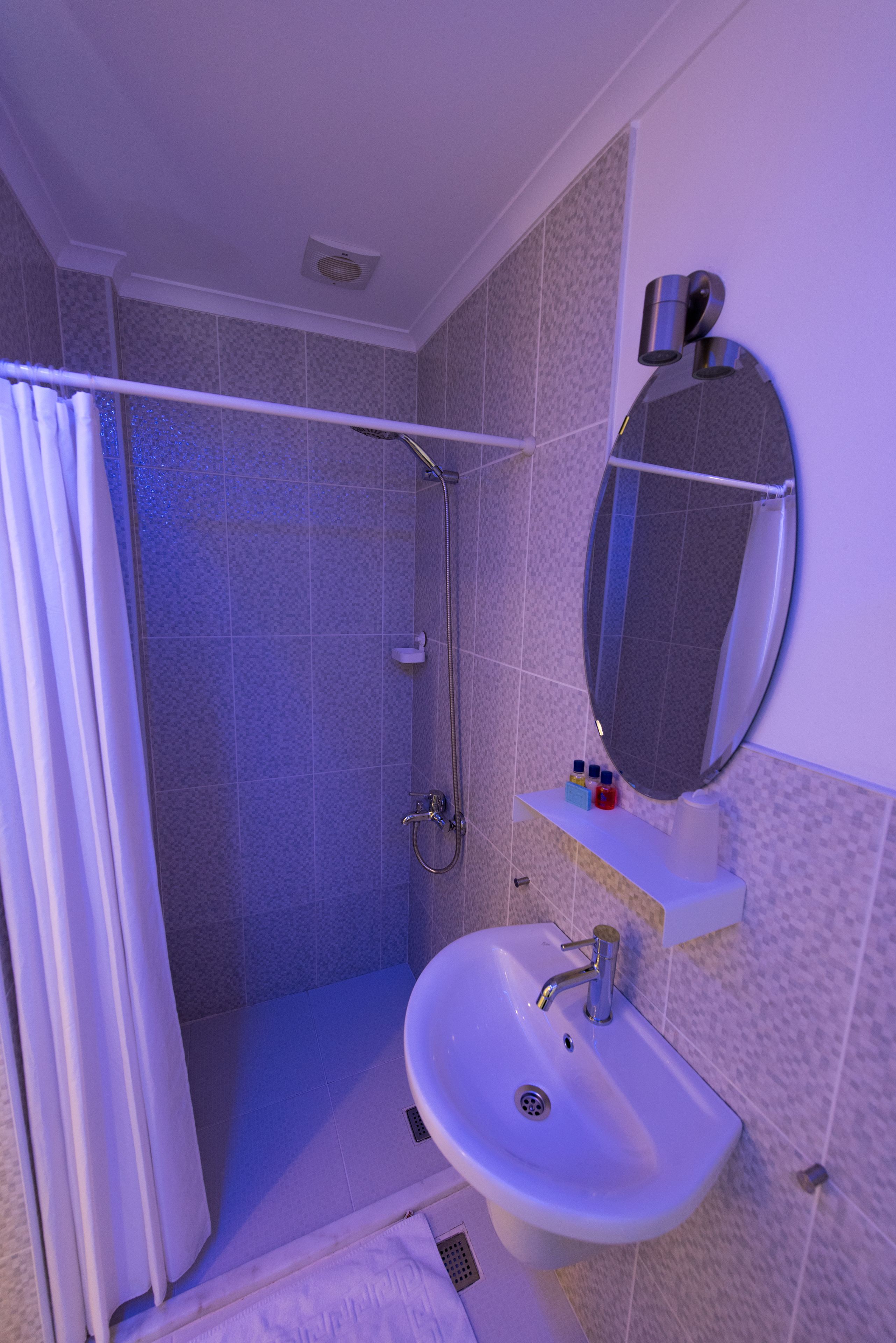 shower, free toiletries, hair dryer, slippers