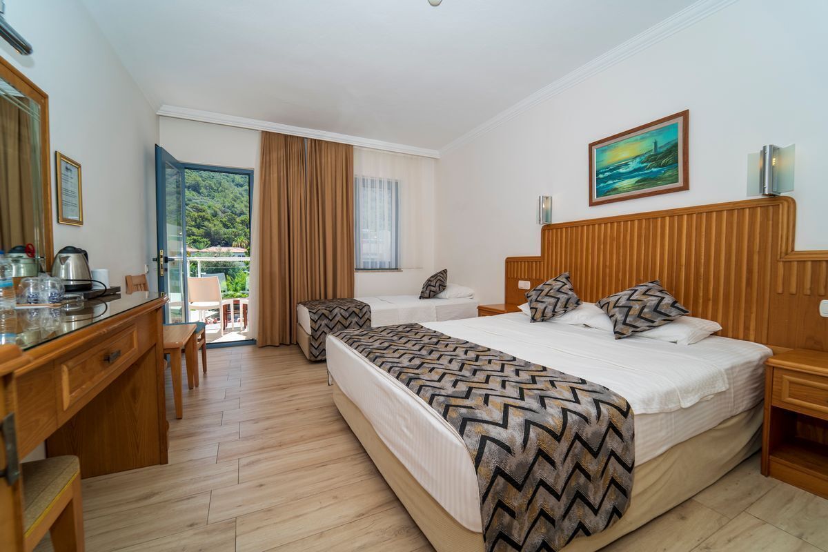 Ropa de cama de alta calidad, minibar, escritorio y cortinas blackout 