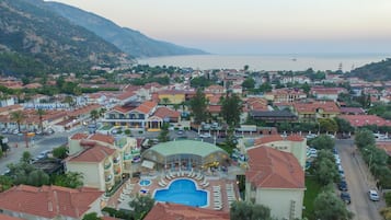 Outdoor pool, pool umbrellas, sun loungers