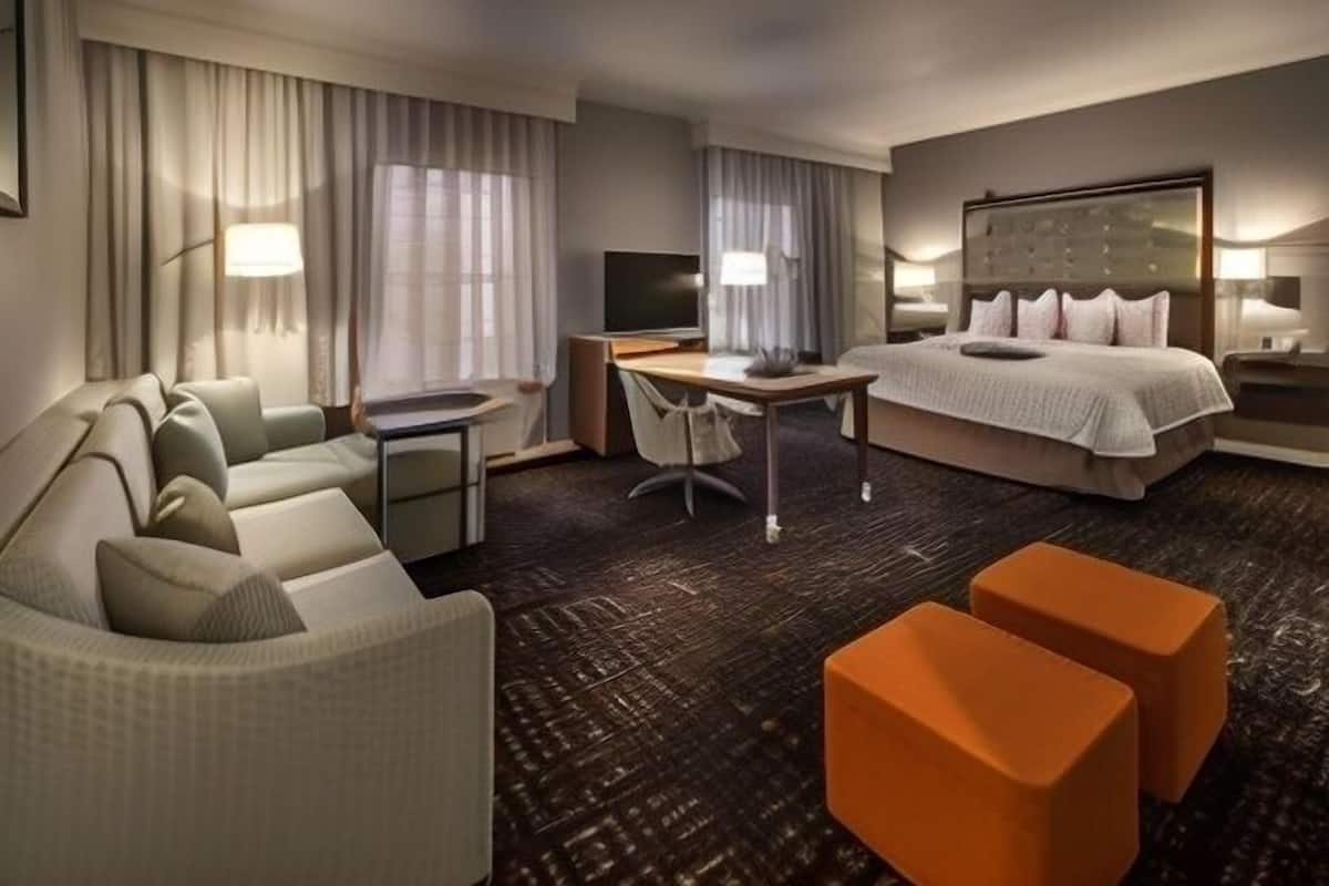 Minibar, coffres-forts dans les chambres, fer et planche à repasser