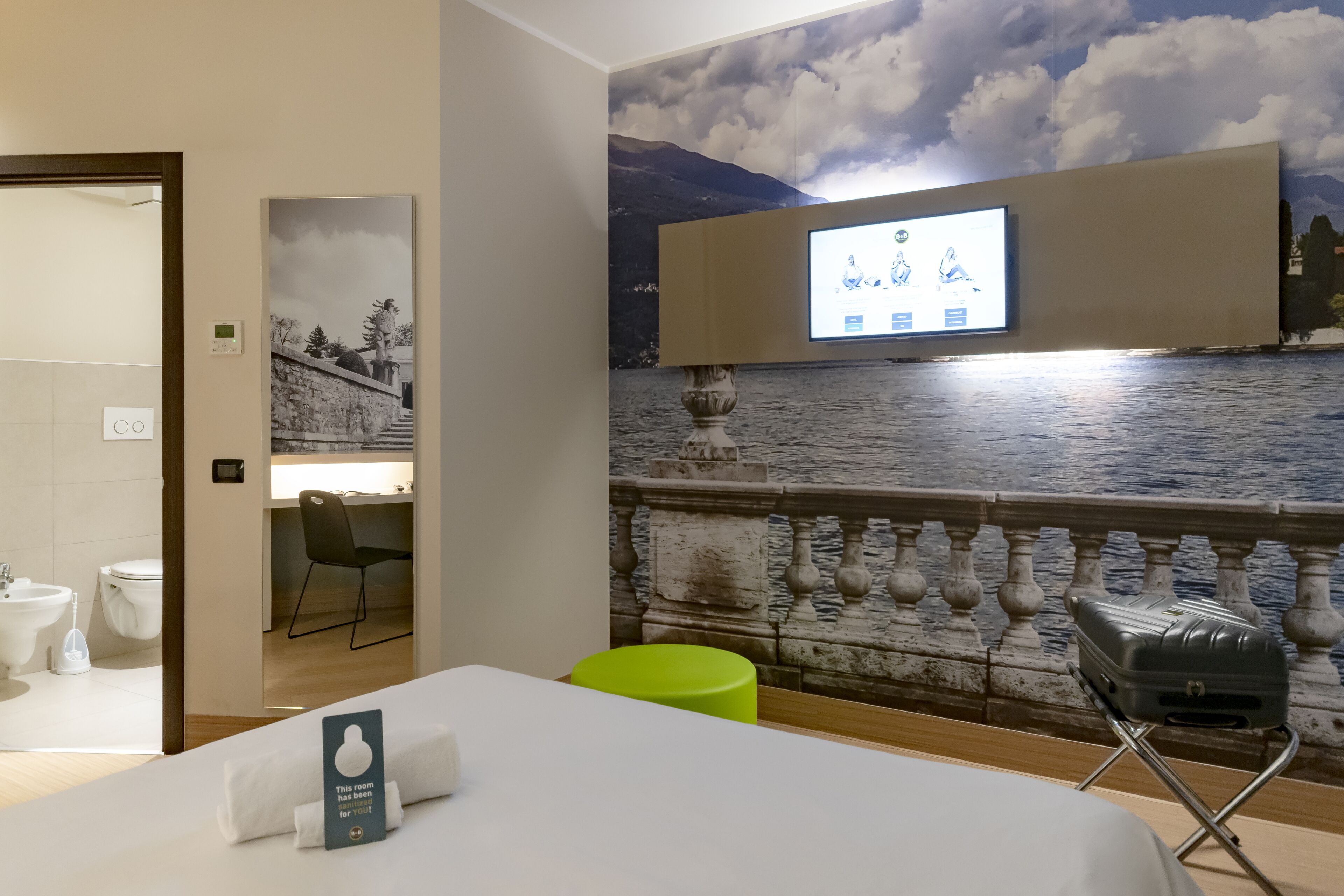 economy double room, non smoking, no windows | in-room safe, desk, iron/ironing board, free wifi