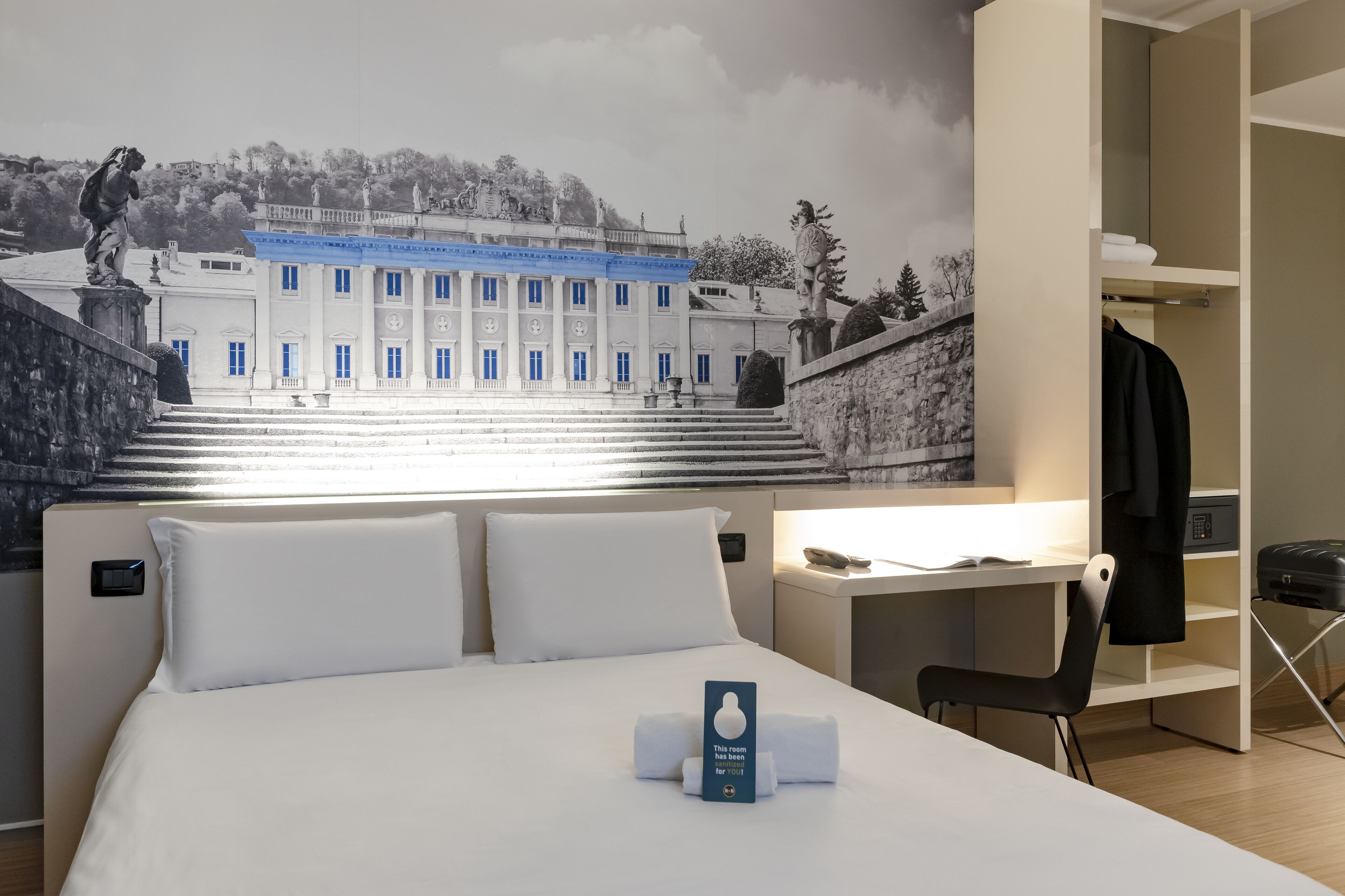 economy double room, non smoking, no windows | in-room safe, desk, iron/ironing board, free wifi